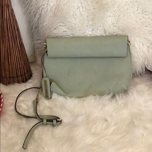 Pale green clutch with strap